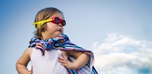 Girl dressed in a superhero costume